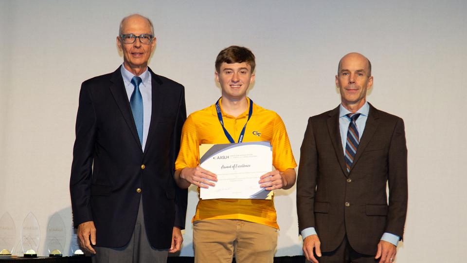 Georgia Tech student Bruce Minix accepts Award of Excellence from the American Association of State &amp; Local History in September 2023.