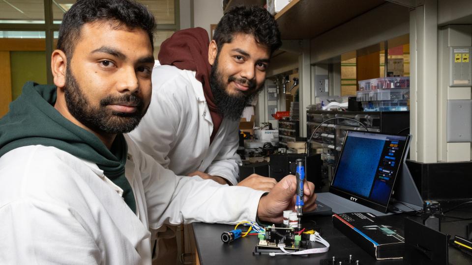 Farhan and Farshid Khan in the lab 